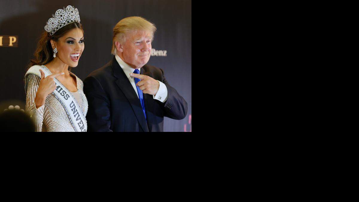 Miss Universe 2013 Gabriela Isler, from Venezuela, and pageant owner Donald Trump pose after the 2013 Miss Universe pageant in Moscow, Russia.
