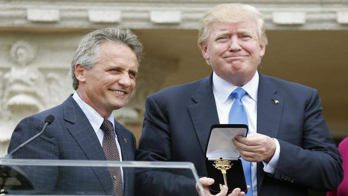 
Donald Trump receives the key to the City of Doral by Mayor Luigi Boria at the Trump National Doral Miami during the unveiling of the Arnold Palmer Villa on Wednesday, March 4, 2015.
