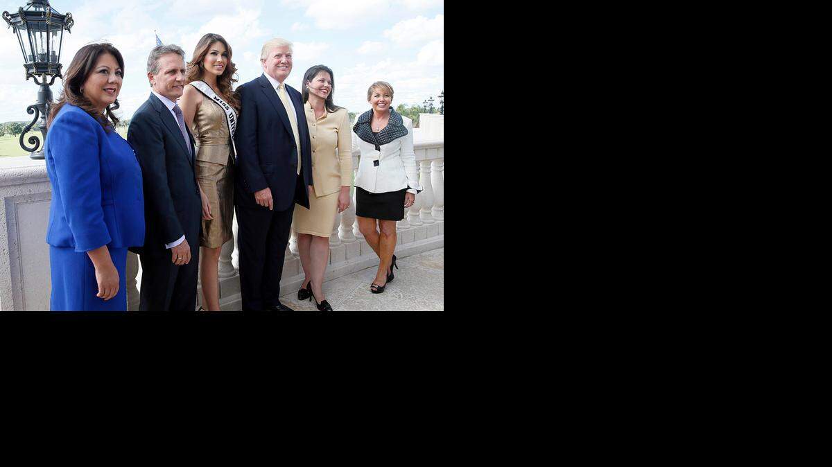 
From left, Doral Commissioner Sandra Ruiz, Mayor Luigi Boria, Miss Universe 2013 Gabriela Isler, Donald Trump, Commissioner Ana Maria Rodriguez and Miss Universe Organization President Paula Shugart pose after a press conference to announce that the 63rd annual Miss Universe Pageant 2014 will be held at FIU.
