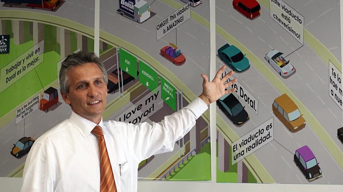 
Then-candidate Luigi Boria, now Doral’s mayor, speaks inside his $200-a-month campaign office in 2012.
