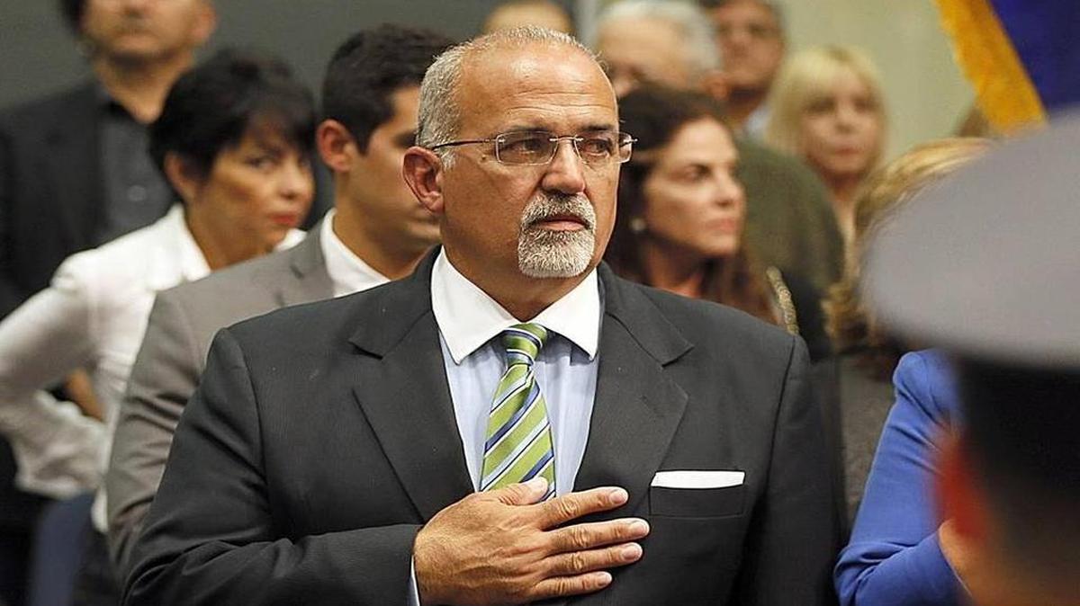 City of Doral councilman Pete Cabrera, salutes the colors during the swearing ceremony at City Hall, on Wednesday Nov. 5, 2014.