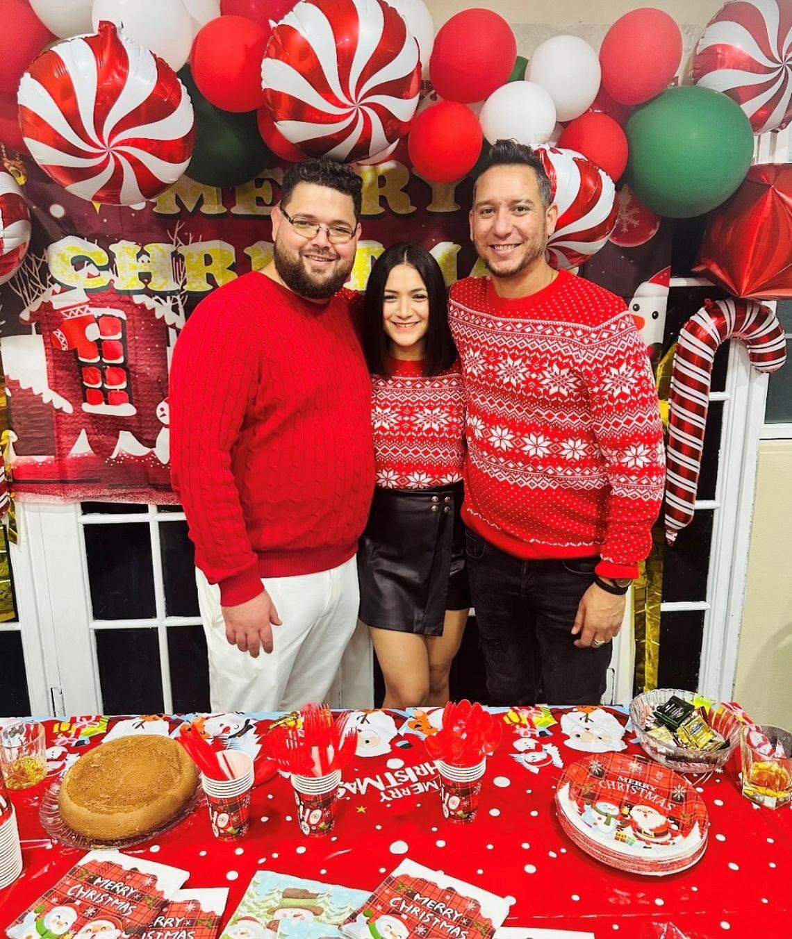 Miguel Jerez, 34, (left) Yarinis Jerez, 30, (center) and Carlos Milan, 38, (right) at a Christmas celebration before the shooting at Martini Bar on April 6, 2024. The Jerez siblings are filing a lawsuit against the nighclub and CityPlace for negligence.