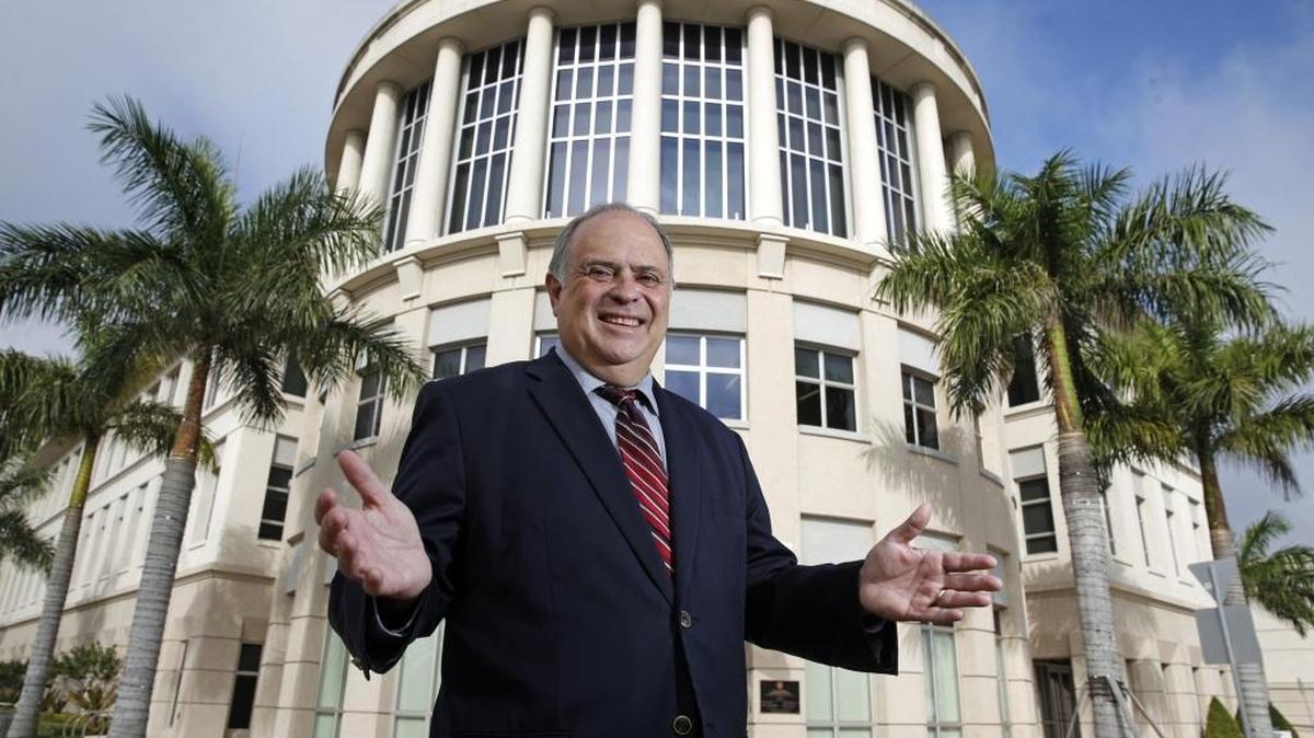 Doral’s founding mayor, Juan Carlos “JC” Bermudez, stands outside of City Hall. Bermudez beat incumbent Mayor Luigi Boria on Tuesday, Dec. 13, 2016, in a runoff election, winning back the seat he had held for nine years.