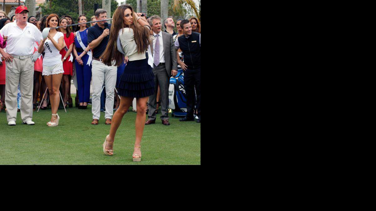 
The city of Doral has hired a team to analyze the economic impact of the Miss Universe pageant. In September, the city committed to spending $2.5 million to host this year’s pageant. That has led to many preliminary events being held in Doral, such as this one on Monday, Jan. 12 at the newly renovated “Red Tiger” golf course at Trump International Doral Miami. Miss Canada nails her drive leaving fellow contestants and Donald Trump at awe.
