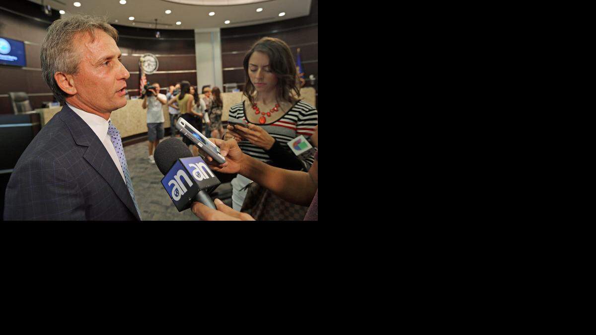 
Doral Mayor Luigi Boria speaks to the media about the positive influence that Miss Universe Pageant will have in the city on Monday, Nov. 24, 2014
