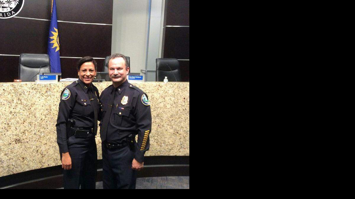 
Newly promoted Doral police officers Capt. Fatima Nuñez and Lt. Carlos Arango after a promotion ceremony at City Hall on Oct. 8, 2014.

