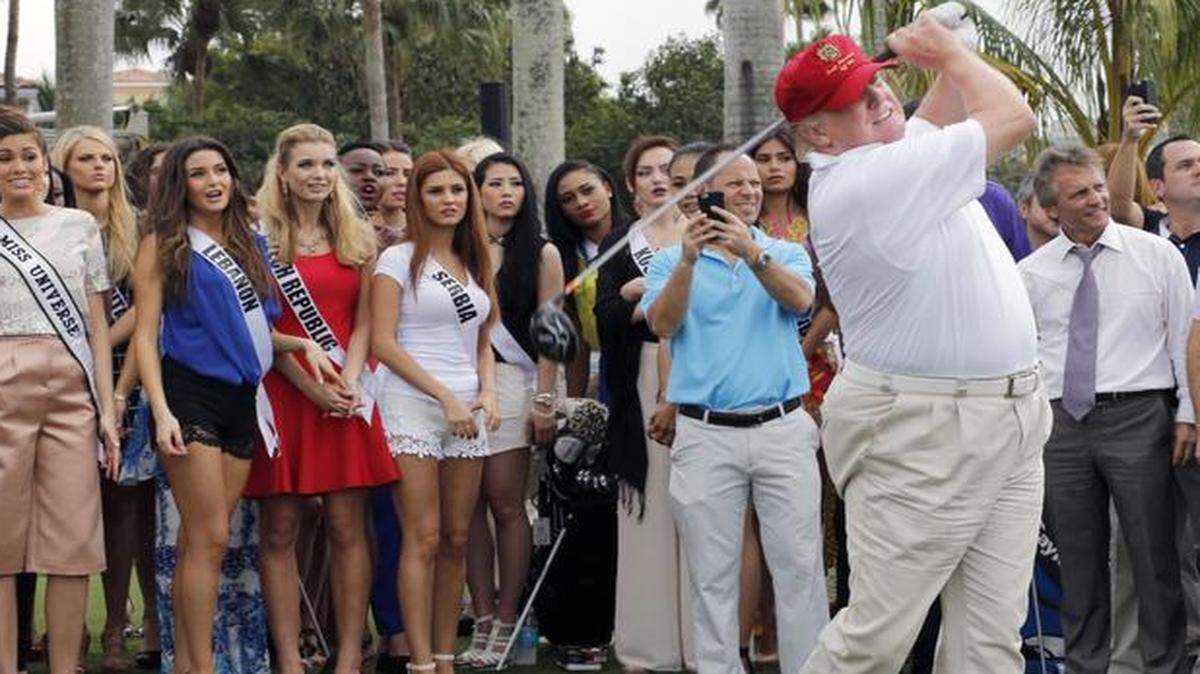
Donald Trump tees off on the Red Tiger golf course. Trump and Miss Universe contestants teed off on the newly renovated course at Trump National Doral Miami on Monday, Jan. 12, 2015.
