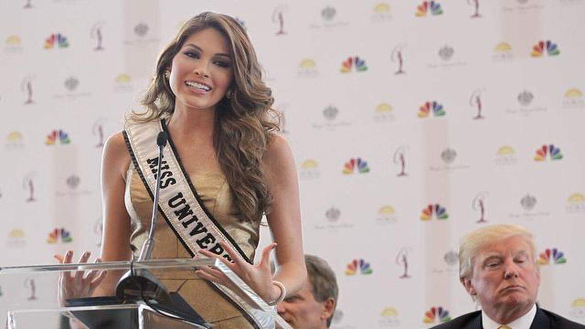 
Doral Mayor Luigi Boria and Donald Trump join Miss Universe 2013 Gabriela Isler as she speaks during a press conference to announce that FIU will host the 2014 Miss Universe Pageant in January.
