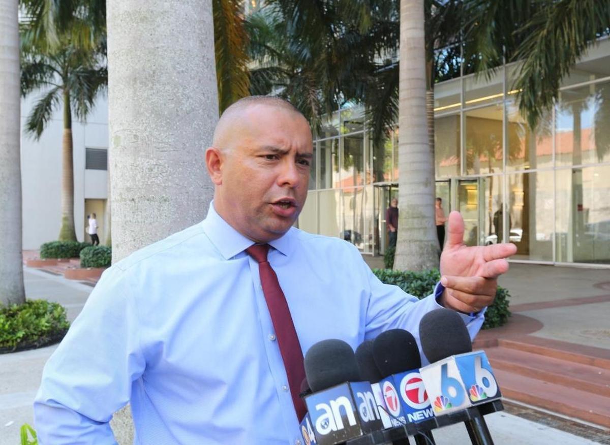 Miami-Dade Detective Alvaro Zabaleta talks to the media at the main library in downtown Miami on Wednesday, May 3, 2017.