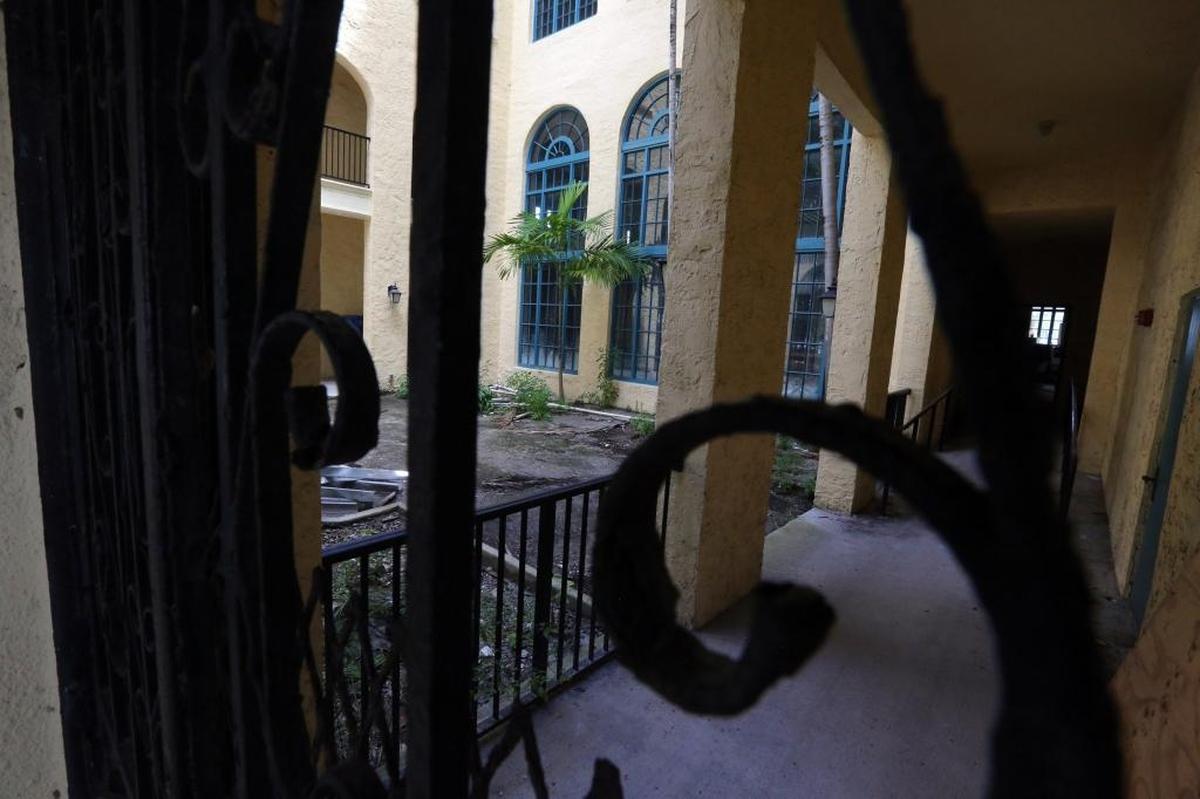 Miami Women's Club, a historic building in downtown Miami near the Omni, is slated for renovation but the developer wants to cut down the old trees in front and expand the parking lot.