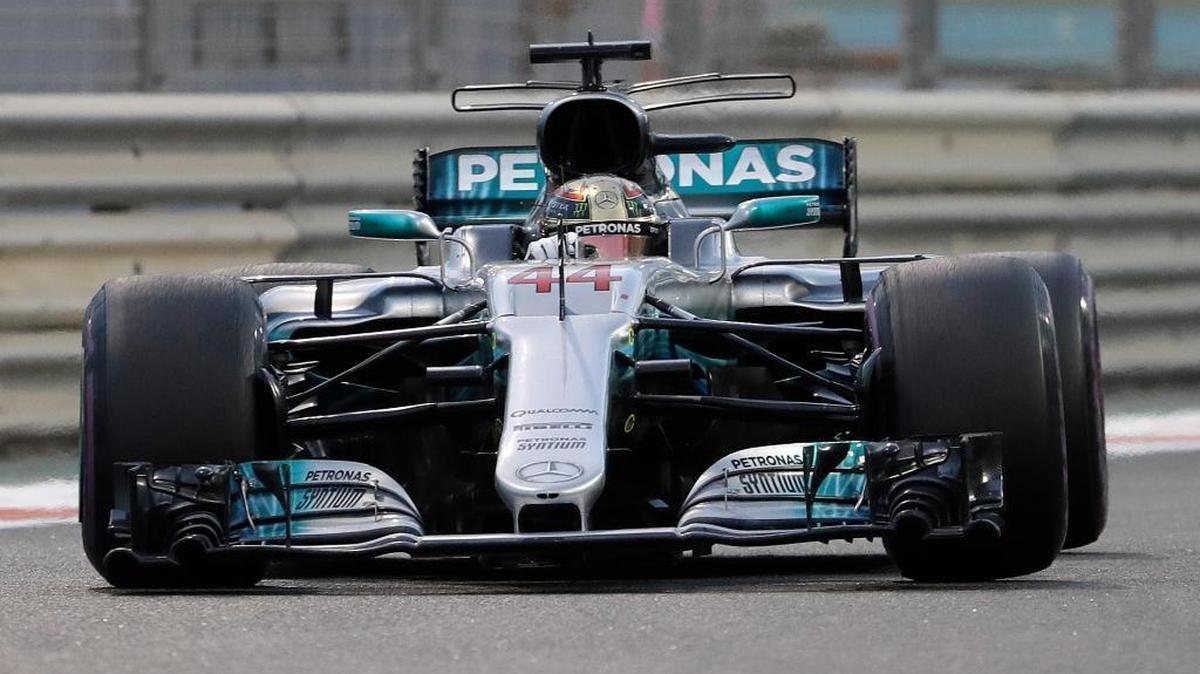 2017 Formula One champion Lewis Hamilton of Great Britain steers a Mercedes-Benz race car during the Emirates Formula One Grand Prix at the Yas Marina racetrack in Abu Dhabi, United Arab Emirates, on Sunday, Nov. 26, 2017.
