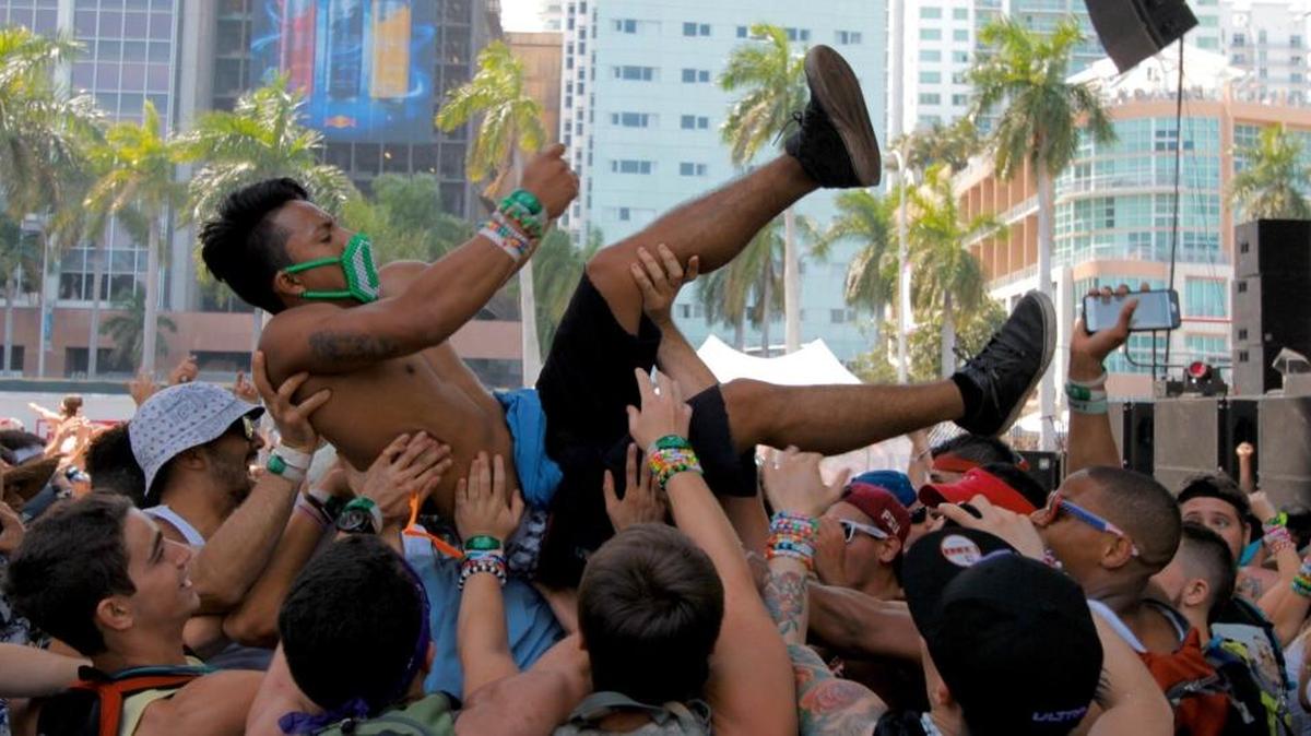 A fan crowd surfs during Le Youth's set at the Worldwide Stage at last year’s Ultra Music Festival.