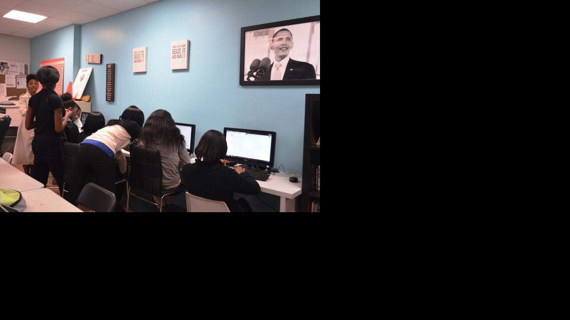 
Margarita Beckford, the post-high school coordinator at the Overtown Youth Center, informs students about activities planned for the month. 
