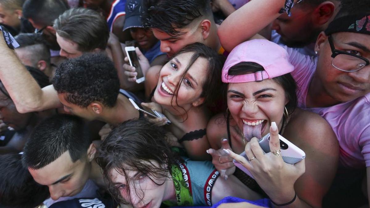 Festival-goers get squished during XXXTentacion's performance during the second day of the Rolling Loud Festival in downtown Miami on Saturday, May 6, 2017.