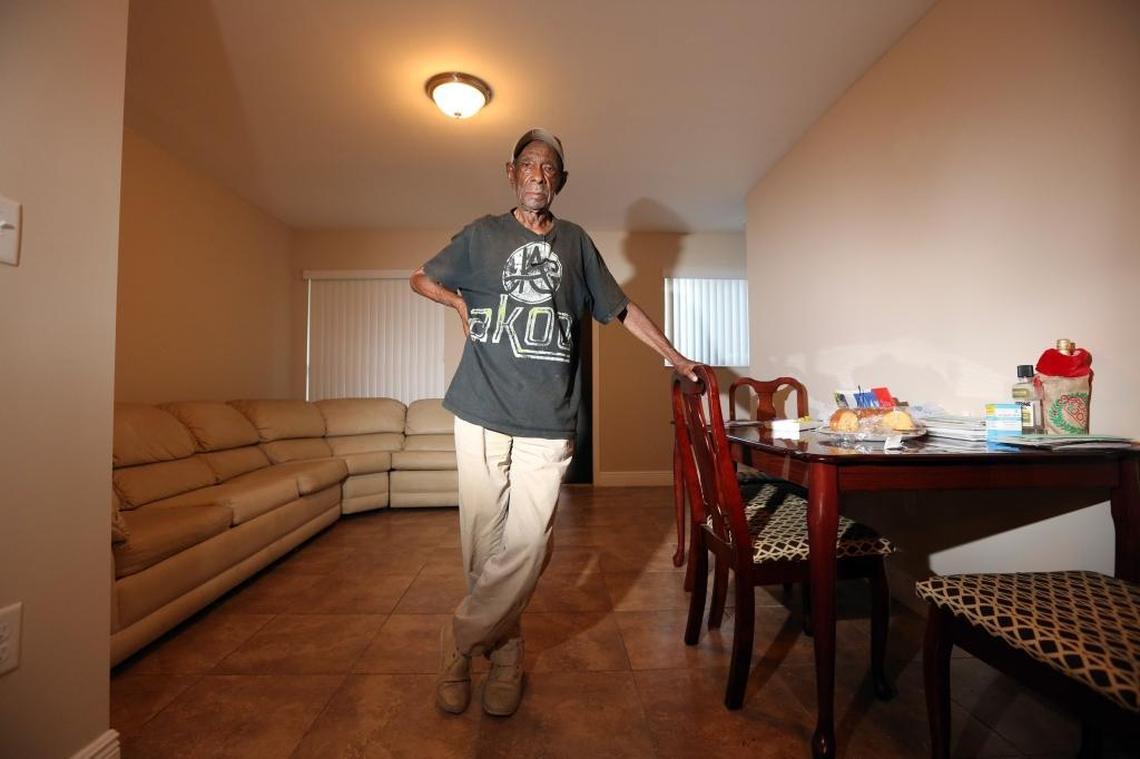 Ellis Prince, 88, stands in his newly renovated unit at Town Park Plaza North. Prince says there are still a few problems with the new unit, including doors that weren’t sealed properly, but he feels lucky. Many of his friends and neighbors in the complex are still awaiting renovations of their crumbling condos.