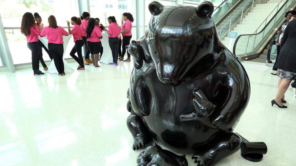 
 A sculpture of a large mother Florida Black Bear and her cubs, by artist Tom Otterness, graces the lobby of the Judge Seymour Gelber and Judge William E. Gladstone Miami-Dade Children's Courthouse.
