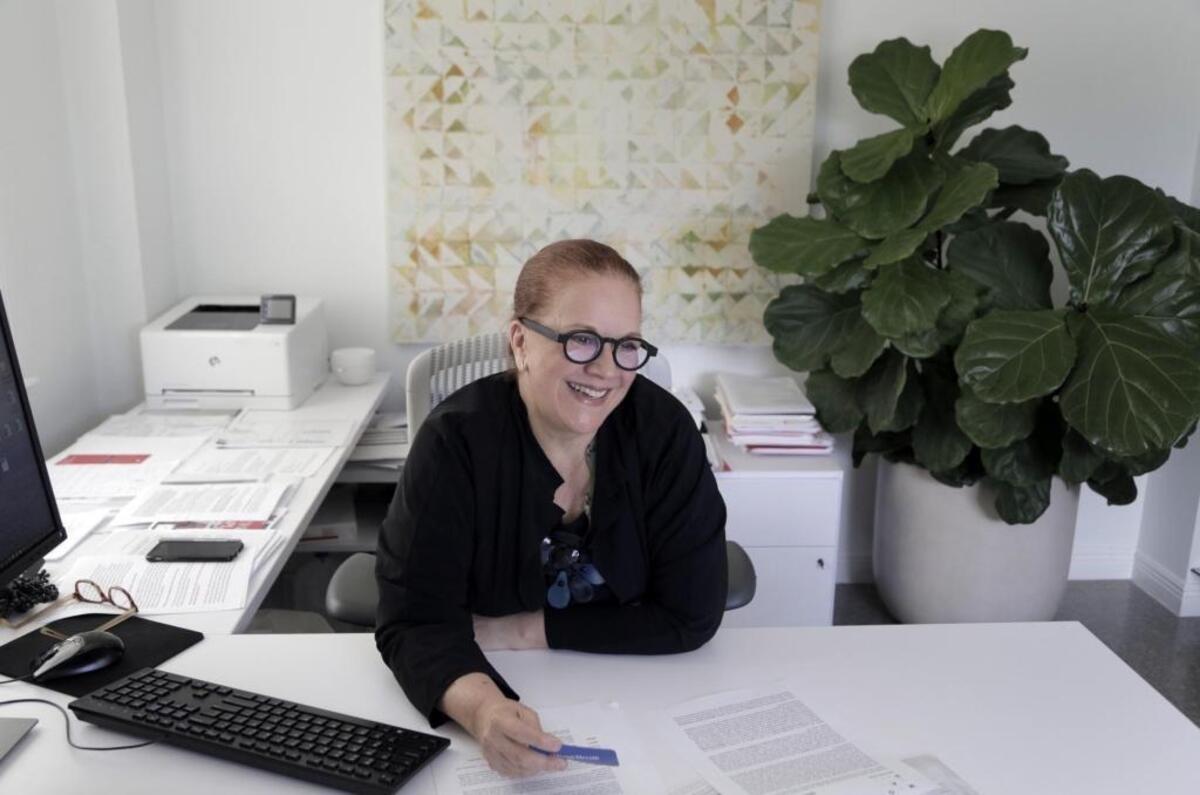 Rina Carvajal, the new director of Miami Dade College’s Museum of Art + Design, in her office in the Freedom Tower. MOAD will reopen to the public Saturday, April 7, with a sharpened focus on design and a new goal: to bring art and ‘cultural action’ to the streets and neighborhoods of the city. Carvajal calls it ‘a museum without boundaries.’