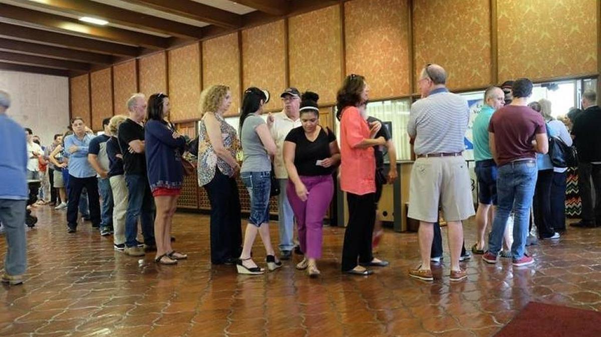 Voters line up at the Coral Gables Library on March 13, 2016, during the last day of early voting in Miami-Dade before Florida’s March 15 presidential primary.