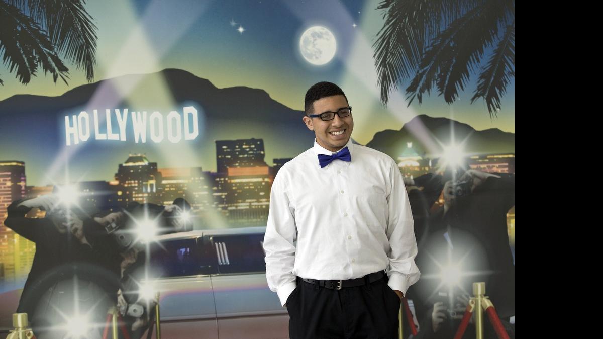 
Thomas Dario Fernandez 18, of Hialeah High School is one of 500 high school students that attended the 10th annual prom for high school students with autism spectrum disorder at the University of Miami in Coral Gables on Thursday, May 14, 2015.
