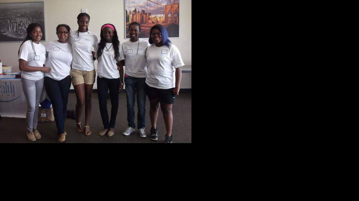 
As part of a Women’s Breast Health Initiative event, Archbishop Curley Notre Dame Prep students went into the North Miami community to schedule free mammograms and heart screenings for low-income women. From left to right are Naika Imbert, Briana Gaspard, Melissa Gabriel, Maniola Mompremier, Ashley Savain and Samantha Jean.
