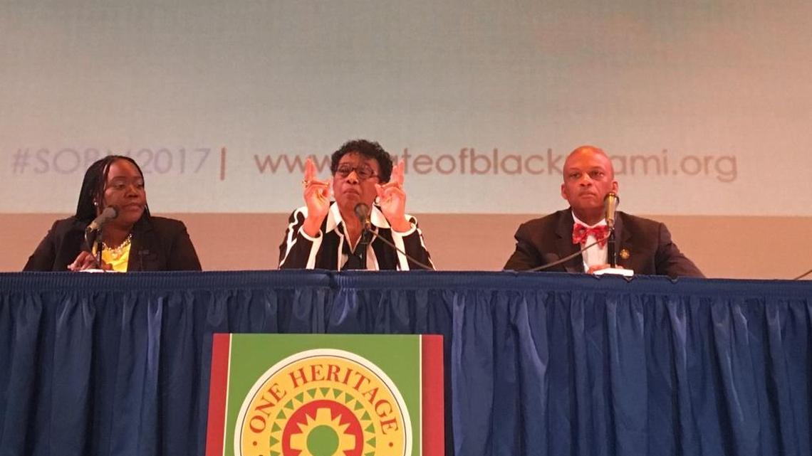 Miami-Dade Commissioner Barbara Jordan, center, addresses the “State of Black Miami Forum” on Wednesday. To her right is Daniella Pierre, a board member of the Miami-Dade branch of the NAACP, and to her left is Miami Gardens Mayor Oliver Gilbert.
