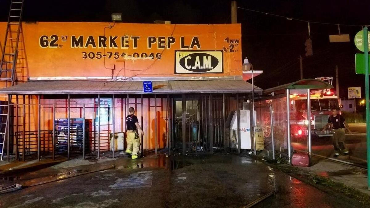 A predawn fire at the 62nd Street Market Pep La on Tuesday, Dec. 5, 2017, injured no one, but it is the second fire in a week at the store. Fire investigators are looking into possible arson.