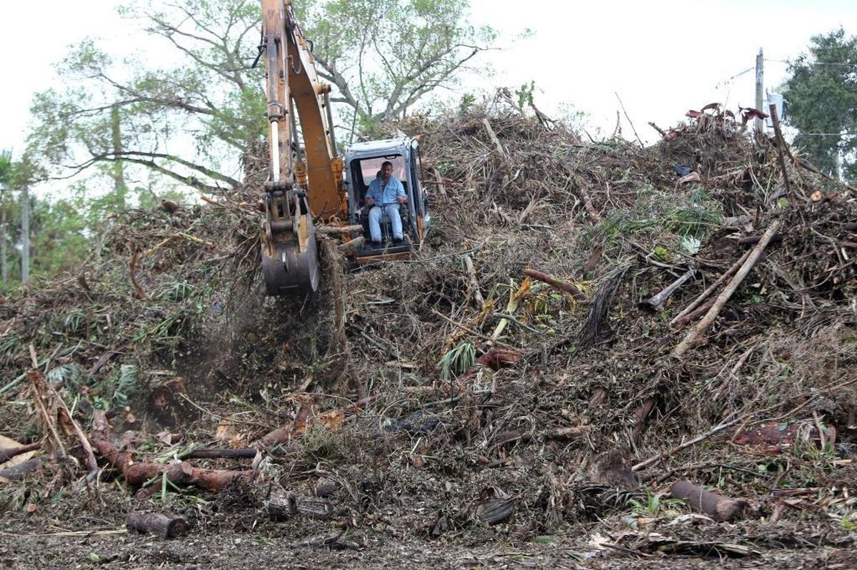 September file photo of debris cleanup at the Village of Biscayne Park.