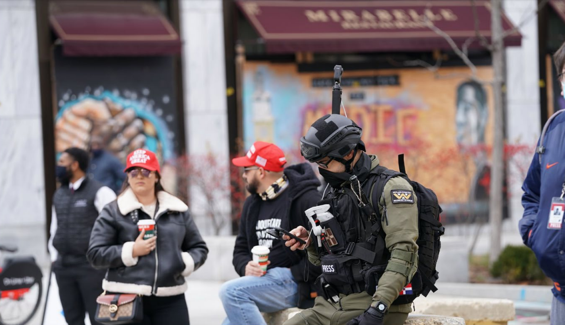 Barbara Balmaseda and Gabriel Augustin Garcia, member of the Vice City Chapter of the Proud Boys, in Washington D.C., on Jan. 6, 2021.