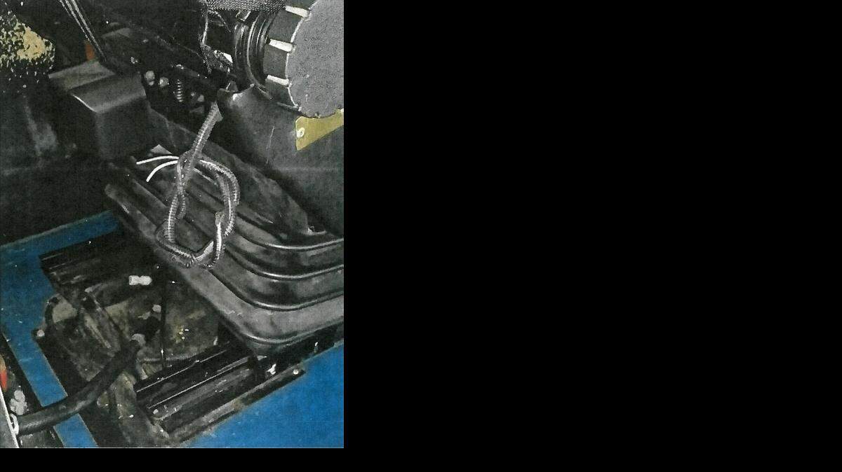 
An investigation photograph shows the cord tied up in knots for the disabled seat alarm on Laquita Alvin’s bus.
