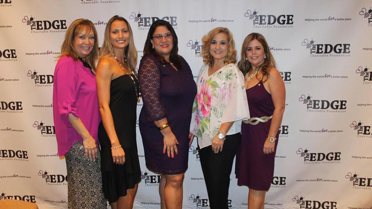 Mercy Hernandez, left, founder of the EDGE Charitable Foundation, with Jennifer Brown, Mio Serrano, Clare Willis and Lourdes Lopez.