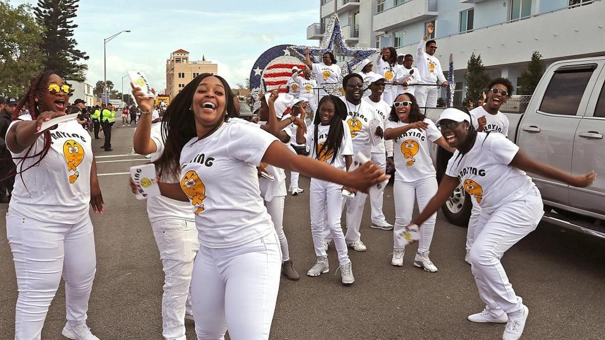 Members of New Vision for Christ Ministries dance to the sounds of gospel-hiphop in the 41st Annual Martin Luther King Jr. Day Parade in Liberty City as it made its way west toward 27th Avenue on 1700 block of NW 54th Street in Miami on Monday, Jan. 15, 2018.