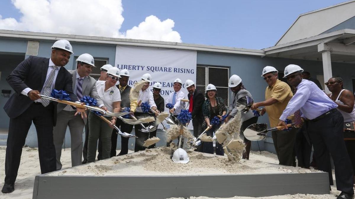 Miami-Dade County and other officials break ground during a ceremony to launch the redevelopment of the Liberty Square Rising project in Liberty City in May 2017. Less than a year later, the first of roughly 200 units are almost available for occupancy.