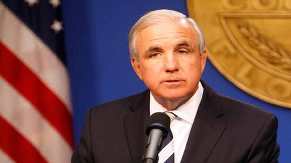 
Mayor Carlos Gimenez unveils Miami-Dade’s budget at a County press conference on July 8.
