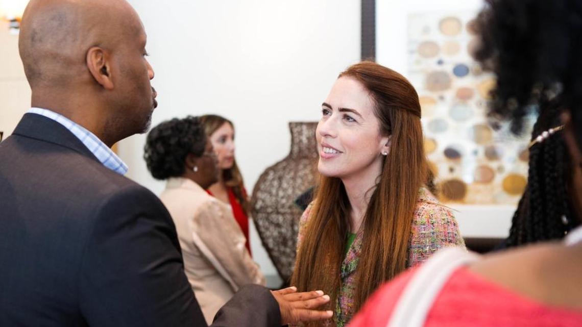 From left: Miami-Dade County Judge William Thomas, 48, speaks with Raquel Regalado, who is running for Miami-Dade County mayor, at the Pumps, Pearls and Politics campaign event at the Intercontinental Hotel in Doral on Saturday, Aug. 6.