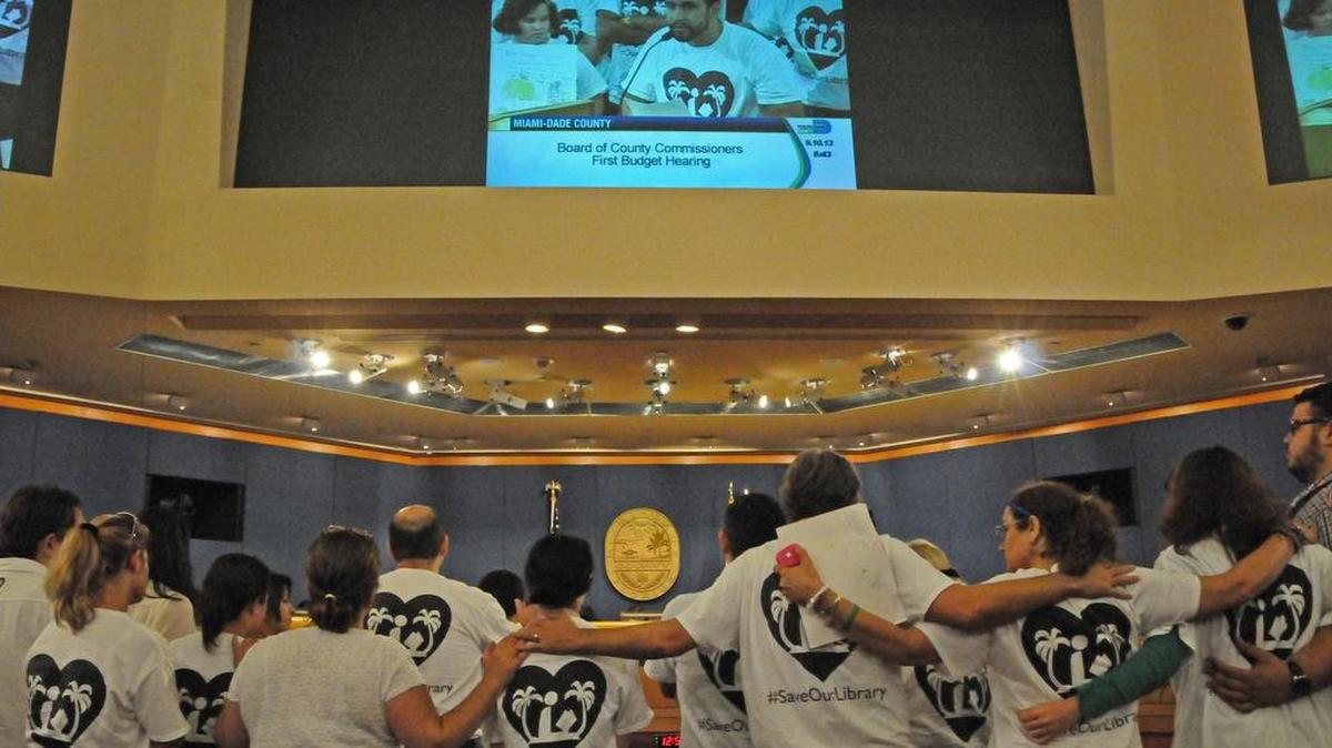 
Library staffers and supporters gathered together to speak in favor of saving Miami-Dade County libraries, Tuesday, September 10, 2013, as commissioners held their first public hearing on the proposed 2013-14 budget.
