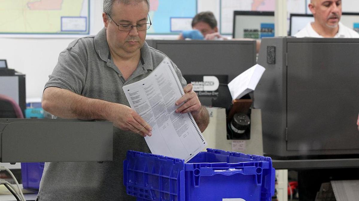 Miami-Dade County Election department staff members work on the recount process of the county’s November 6th elections at the elections department in Doral on Saturday November 10, 2018.