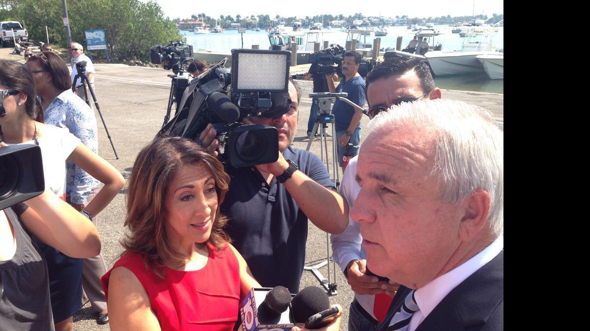 
Miami-Dade Mayor Carlos Gimenez talks to a press gaggle that finds Channel 10’s Glenna Milberg front and center on Friday, May 22, 2015. The event was a press conference on boat safety in Miami, but reporters wanted to ask about Gimenez’s upcoming soccer talks with the financial team of David Beckham. 
