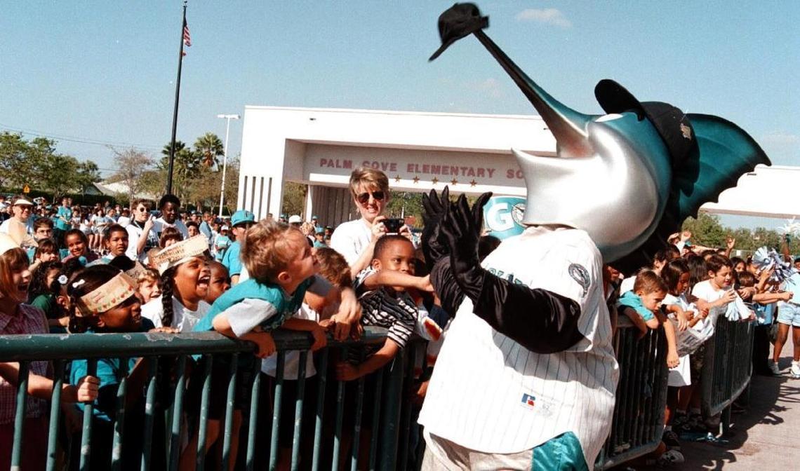 In this 1999 file photo, Billy the Marlin clowns around with Palm Cove Elementary School children during Marlins’ Day at the school in Pembroke Pines. But two years earlier, a Navy SEAL, dressed as the mascot, lost his pointy head when he planned to parachute into Pro Player Stadium for a game. The head fell to the ground and was found weeks later in North Miami-Dade.