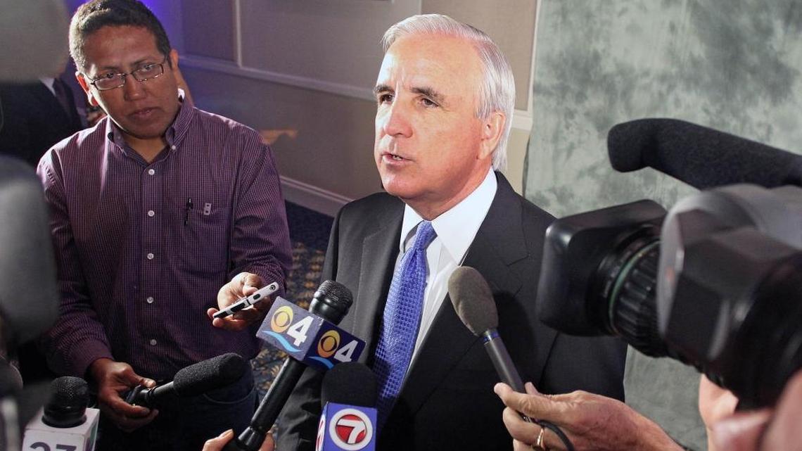Miami-Dade Mayor Carlos Gimenez speaks to the Miami media after after a speech in Hialeah in February 2014