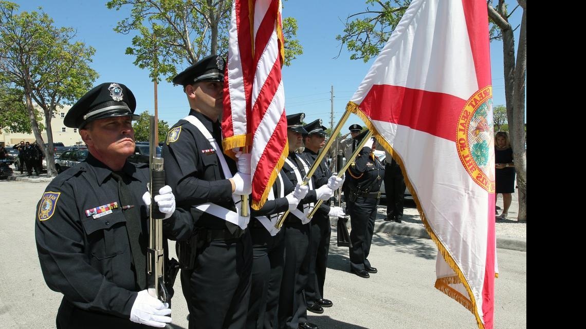 
An honor guard on May 7 pays tribute to four Hialeah police officers who died in the line of duty.
