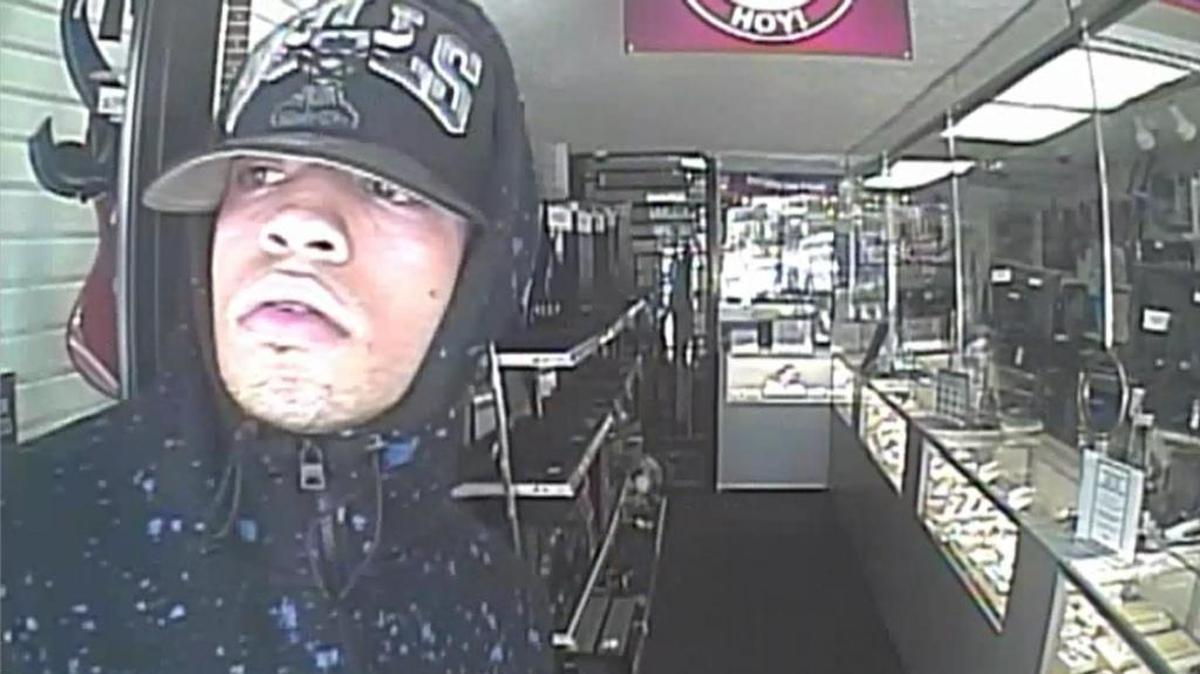 Hialeah police say two men including the one pictured entered a pawn shop Tuesday and robbed it at gunpoint. They then took off in a stolen car driven by a third man. All three were later captured by police.