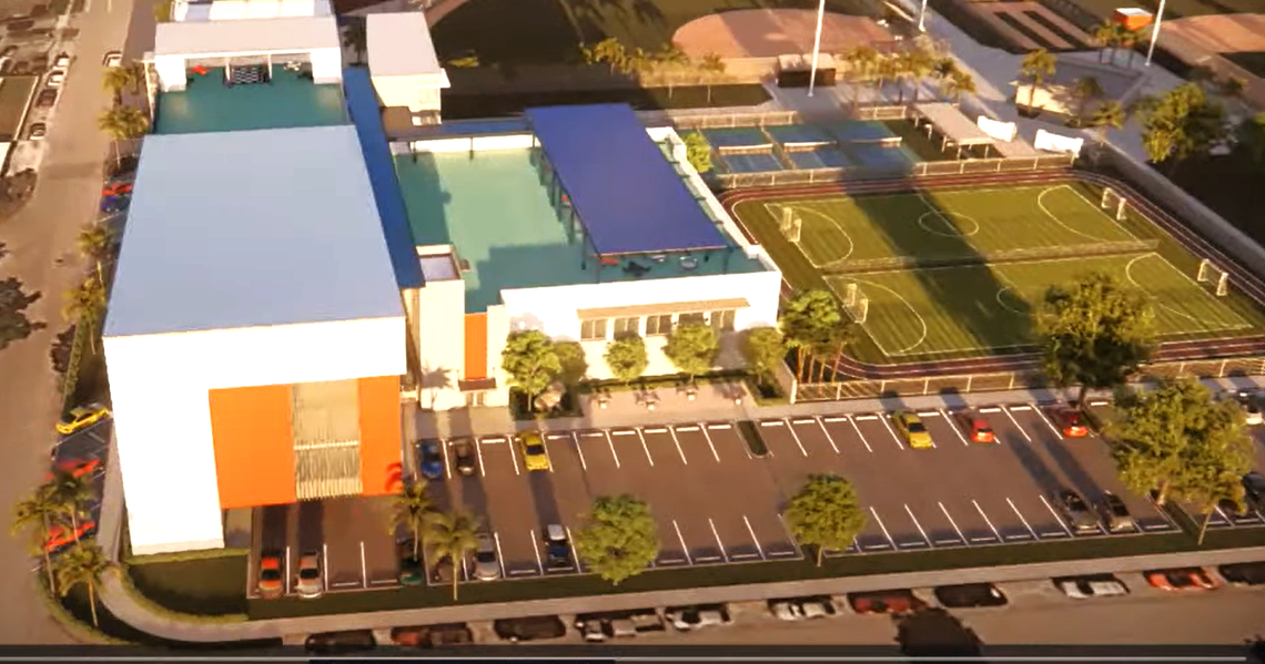 Proposed southwest view of the City of Hialeah Educational Academy charter school expansion over Slade Park, which will transform the western portion of public land. The plan includes replacing the existing southwest field with new amenities such as a gymnasium, turf field, track, soccer pitch, pickleball courts, and additional parking.