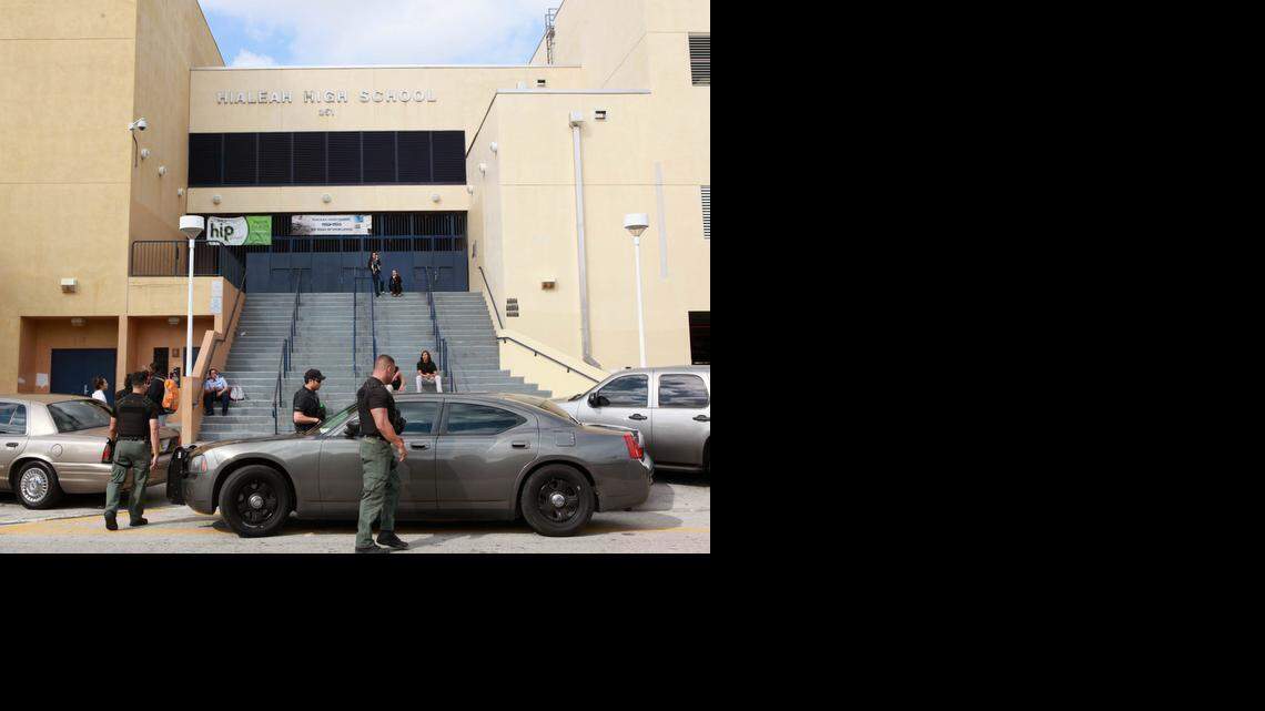 
Unmarked police cars sit outside Hialeah Senior High School on Wednesday, Feb. 4, 2015, during a school lockdown.
