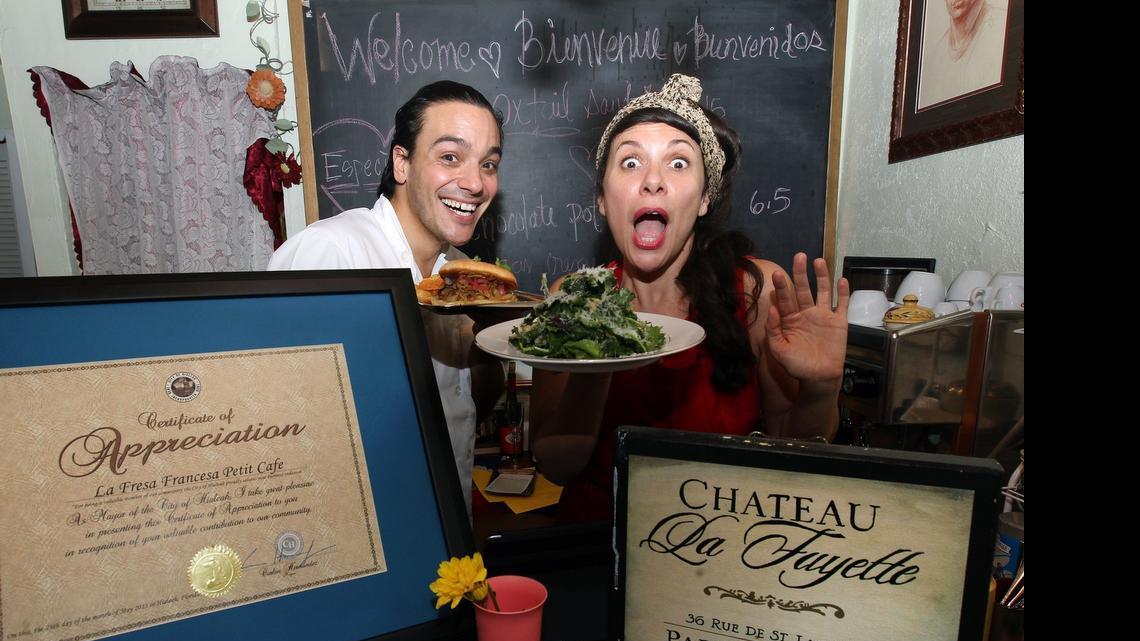 
Benoit Rablat and Sandy Sanchez, owners of the La Fresa Francesa Petit Café, celebrate on opening day. 
