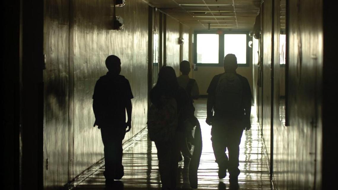 Students who were a few minutes late for class on the first day of school search for classrooms at Jose Marti Mast 6-12 Academy at 5701 W. 24th Ave., in Hialeah on Aug. 22, 2011.