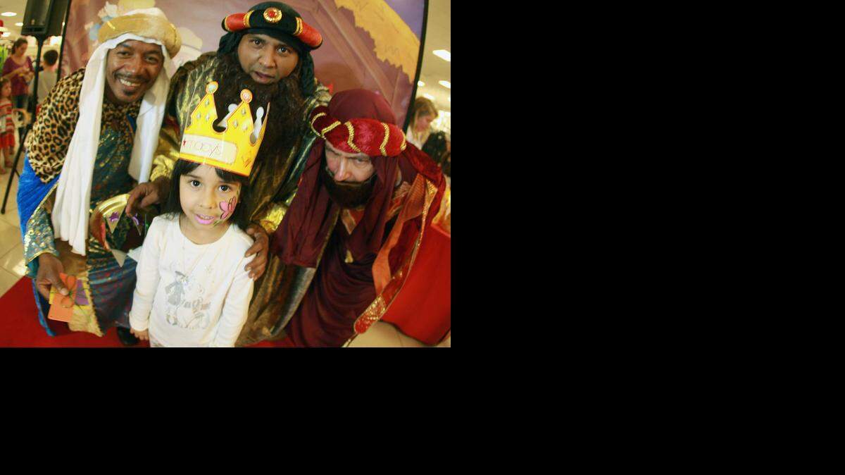 
Kamila Peguero, 5, is among hundreds of children who enjoyed an afternoon with the Three Wise Men at Macy’s in Westland Mall in Hialeah. The children received gifts as part of Three Kings Day, a holiday celebrated on Jan. 6 for many with ancestry from Spanish speaking countries. The festivity stems from the tradition that the Three Kings or Wise Men — Melchior, Caspar and Balthasar — traveled from the faraway Orient with gold, incense and myrrh to pay homage to Baby Jesus who was just born in a manger in Bethlehem.

