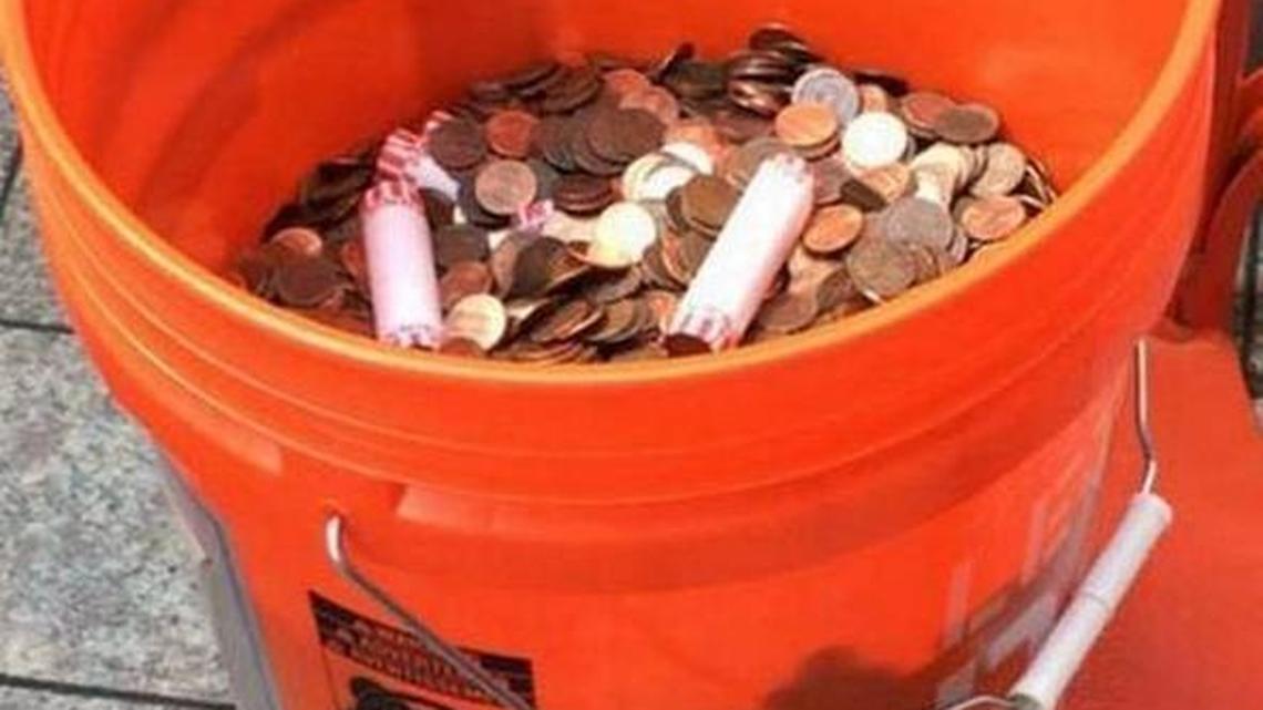 One of the 28 coin-filled buckets Hialeah Mayor Carlos Hernández delivered to the county ethics commission