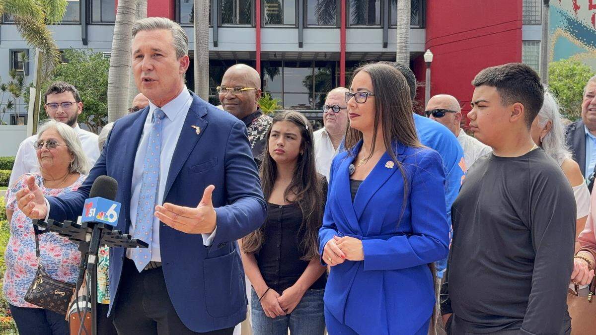 Miami-Dade Commissioner René Garcia endorses interim Mayor Jacqueline Garcia-Roves for Hialeah mayor during a press conference on Monday, June 30, 2025, in Hialeah, FL. Standing beside Garcia-Roves are two of her three children, Jainerlys and Felipe Quiñones.