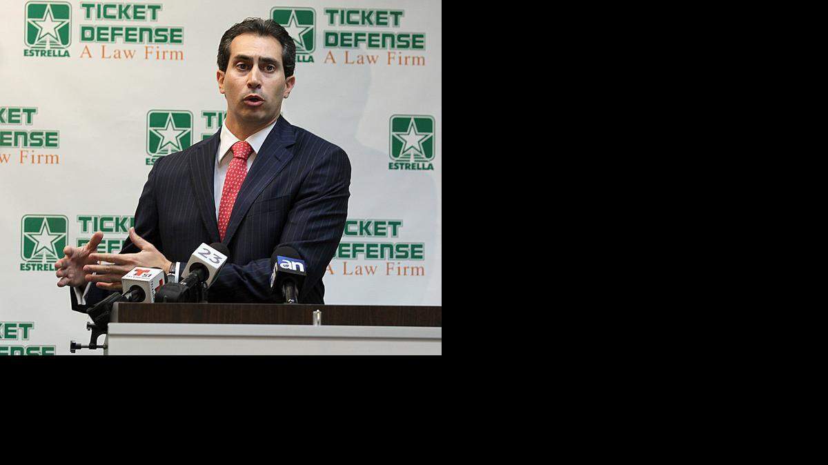 
Attorney Rafael E. Millares, managing shareholder at Estrella Ticket Defense law firm, speaks during a news conference to discuss its federal lawsuit against the largest red light camera company in the U.S., American Traffic Solutions.

