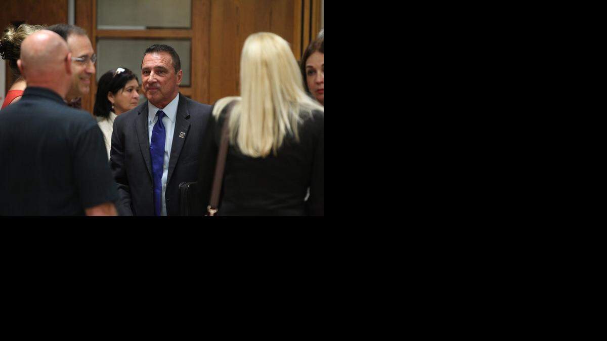 
Ex-Homestead Mayor Steven Bateman walking out of the courtroom late last year.
